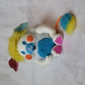 1986 vintage Pocket Popples 3" White with blue and yellow. Posable arms and legs